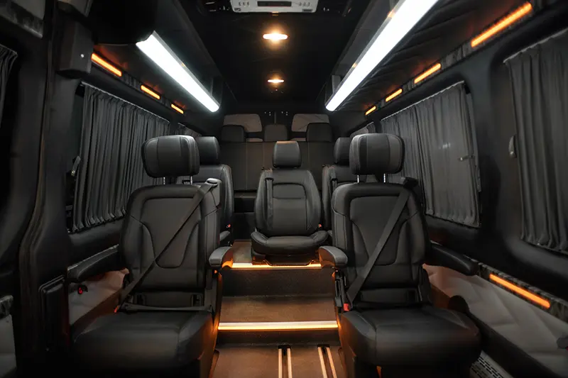 Comfortable interior of a passenger bus with soft seats